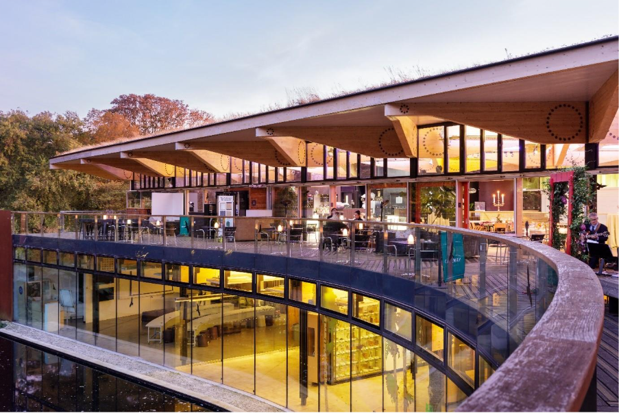 A building with a glass roofAI-generated content may be incorrect.